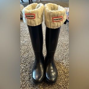 Tall Hunter boots with size large Hunter socks